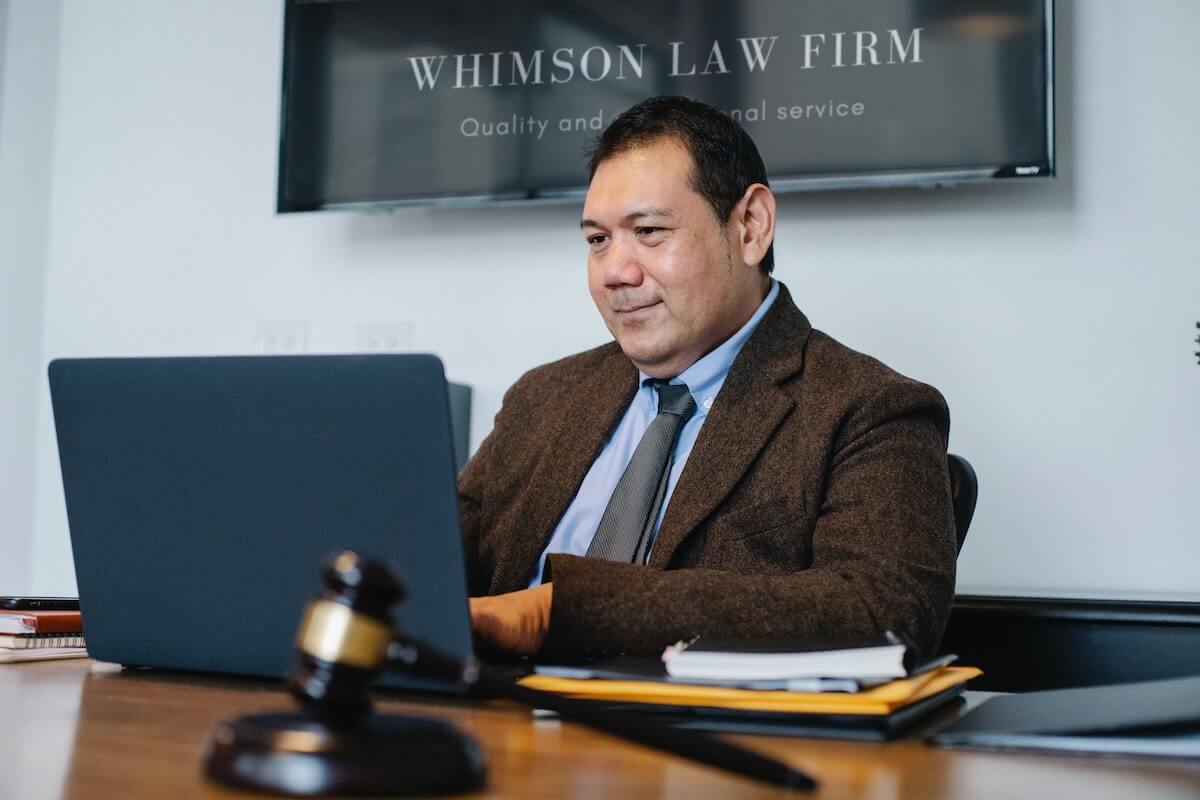 lawyer in office on laptop